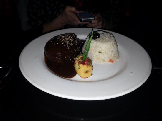 El Agave Restaurant & Tequileria signature dishes Mole NegroEl Agave Chile RellenoDuck Burritos